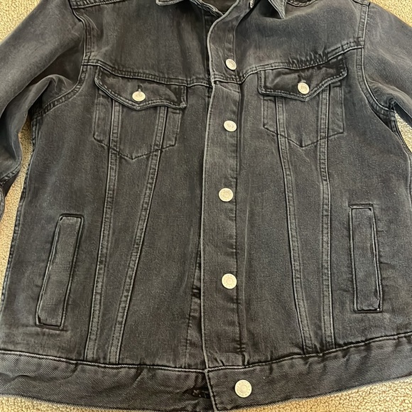 Worn 1 time. Distressed black denim jean jacket. Runs generous. - Picture 6 of 7
